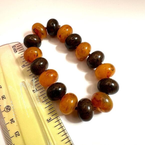 Orange and brown beaded stretchy bracelet - Picture 6 of 7